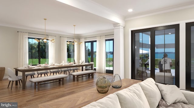 25826 Orchard Ter, Royal Oak, MD 21662 - living room featuring crown molding, a chandelier, wood finished floors, decorative columns, and recessed lighting