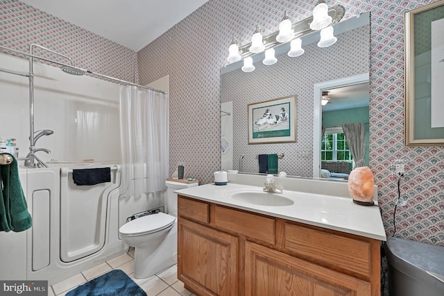 311 Deep Creek Dr, Seaford, DE 19973 - bathroom featuring tile patterned flooring, wallpapered walls, toilet, vanity, and a shower with shower curtain