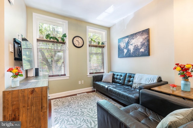 1238 N Mascher St, Philadelphia, PA 19122 - living room featuring wood finished floors and baseboards