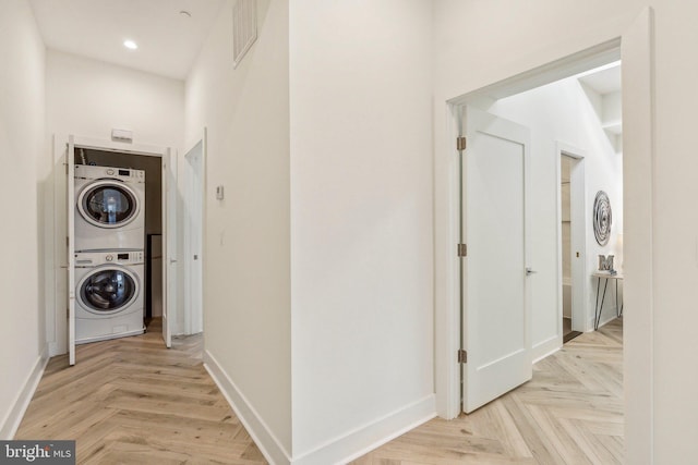 1214 Queen St NE Unit 2, Washington, DC 20002 - laundry area featuring stacked washer / dryer, baseboards, and recessed lighting