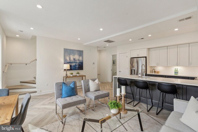 1214 Queen St NE Unit 2, Washington, DC 20002 - living room with stairs, recessed lighting, and baseboards