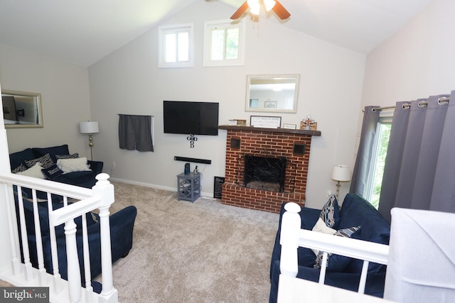 1675 Highland Ter, Saint Leonard, MD 20685 - living room featuring carpet floors, a ceiling fan, a fireplace, high vaulted ceiling, and baseboards