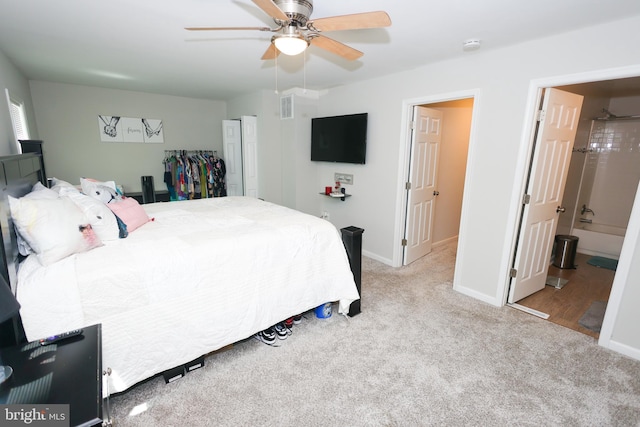 1675 Highland Ter, Saint Leonard, MD 20685 - carpeted bedroom with baseboards, ceiling fan, and connected bathroom