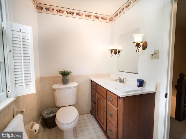 5 Salem Way, Malvern, PA 19355 - half bathroom featuring vanity, toilet, a wainscoted wall, and tile walls
