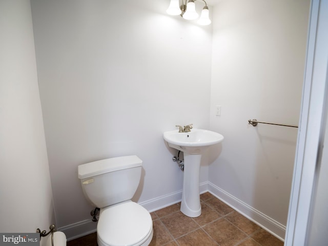 5 Salem Way, Malvern, PA 19355 - half bathroom with toilet, baseboards, tile patterned floors, a sink, and a chandelier