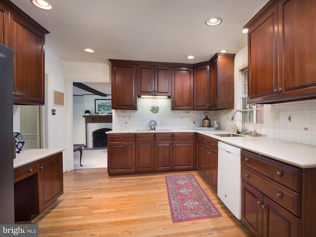 5 Salem Way, Malvern, PA 19355 - kitchen featuring dishwasher, a sink, light wood-style flooring, backsplash, and light countertops
