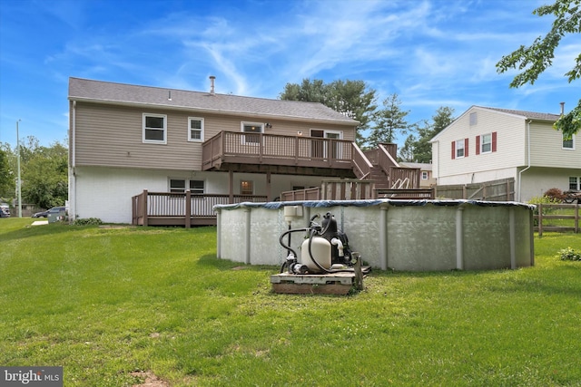 2425 W Colonial Dr, Upper Chichester, PA 19061 - rear view of property featuring a deck and a covered pool