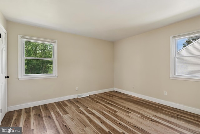 2425 W Colonial Dr, Upper Chichester, PA 19061 - empty room with wood finished floors and baseboards