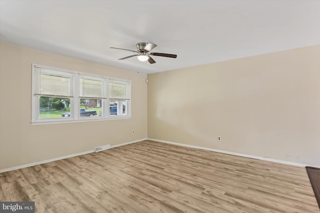 2425 W Colonial Dr, Upper Chichester, PA 19061 - spare room with ceiling fan, light wood-type flooring, and baseboards