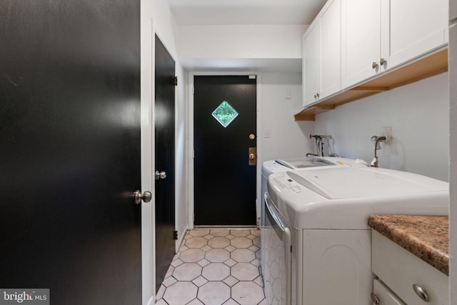 2958 Hannah Ave, Norristown, PA 19401 - washroom with washer and dryer, cabinet space, and light tile patterned floors
