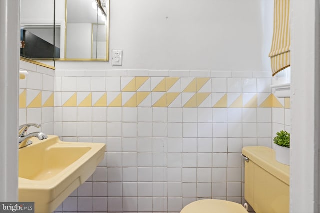 2958 Hannah Ave, Norristown, PA 19401 - half bath featuring tile walls, toilet, and a sink