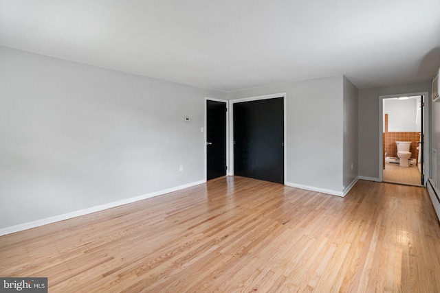 2958 Hannah Ave, Norristown, PA 19401 - unfurnished room featuring light wood-style floors, baseboards, and baseboard heating
