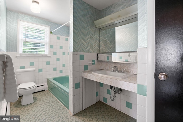 2958 Hannah Ave, Norristown, PA 19401 - bathroom featuring tile walls, a baseboard radiator, toilet, a sink, and shower / bathtub combination