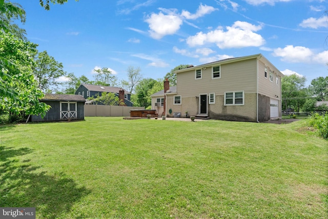 2958 Hannah Ave, Norristown, PA 19401 - rear view of house featuring a hot tub and a garage