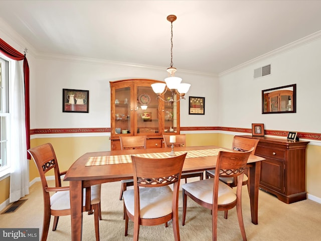 15 Behrens Dr, Palmyra, PA 17078 - dining area with a chandelier, crown molding, light colored carpet, and baseboards