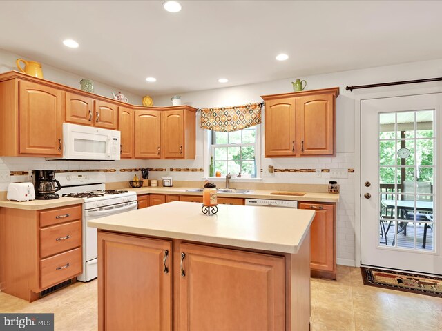 15 Behrens Dr, Palmyra, PA 17078 - kitchen featuring white appliances, a sink, light countertops, decorative backsplash, and recessed lighting