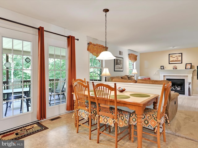15 Behrens Dr, Palmyra, PA 17078 - dining room with a fireplace and light tile patterned floors
