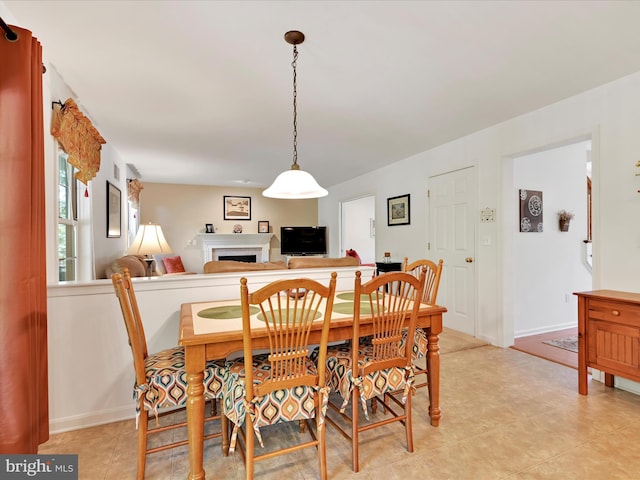 15 Behrens Dr, Palmyra, PA 17078 - dining area with a fireplace and baseboards