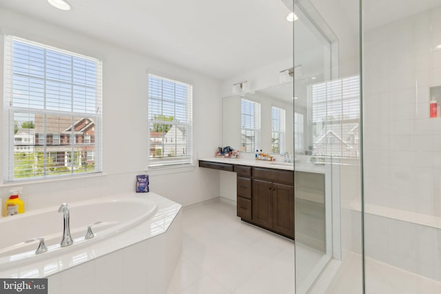 5809 Savannah Dr, Brandywine, MD 20613 - full bathroom with a garden tub, a tile shower, vanity, and tile patterned flooring