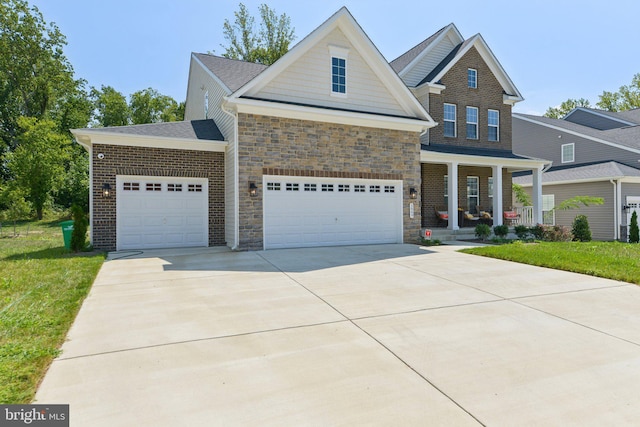 5809 Savannah Dr, Brandywine, MD 20613 - view of front facade with covered porch, a garage, concrete driveway, a front lawn, and stone siding