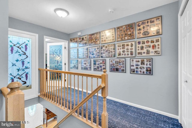 1177 Aster Dr, Toms River, NJ 08753 - hallway featuring an upstairs landing and baseboards