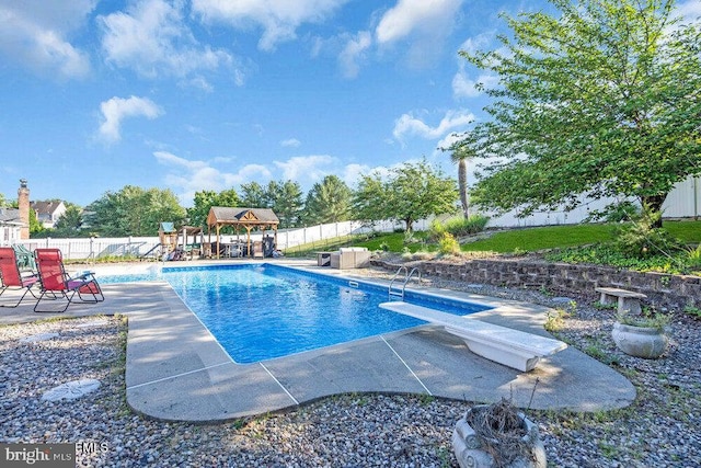 1177 Aster Dr, Toms River, NJ 08753 - view of swimming pool featuring a gazebo, a diving board, and a patio