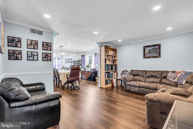 1177 Aster Dr, Toms River, NJ 08753 - living area with crown molding, recessed lighting, wood finished floors, a chandelier, and baseboards