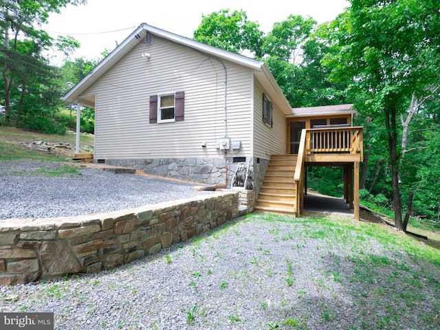 1502 Tomahawk Trl, Winchester, VA 22602 - view of side of property with stairs, a wooden deck, and crawl space