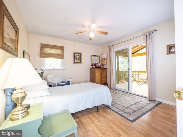 1502 Tomahawk Trl, Winchester, VA 22602 - bedroom with access to outside, light wood finished floors, baseboards, and a ceiling fan