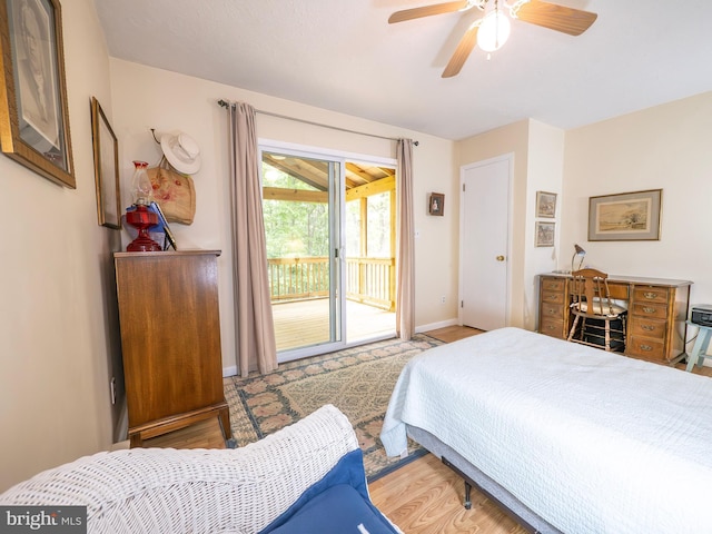 1502 Tomahawk Trl, Winchester, VA 22602 - bedroom with access to exterior, baseboards, a ceiling fan, and wood finished floors