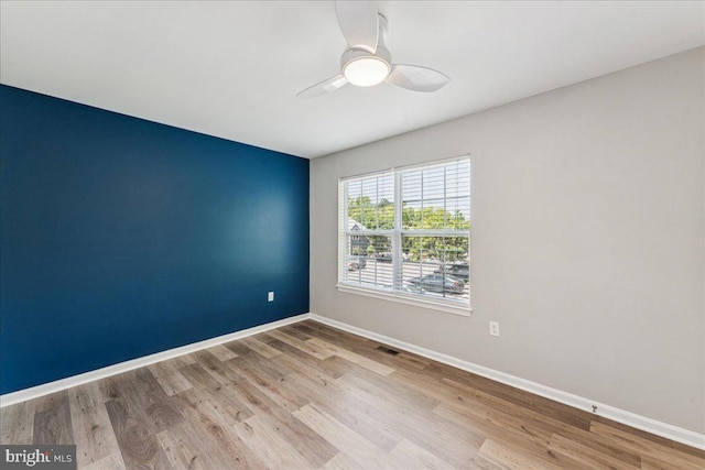 963 Breakwater Dr, Annapolis, MD 21403 - spare room featuring baseboards, a ceiling fan, and wood finished floors