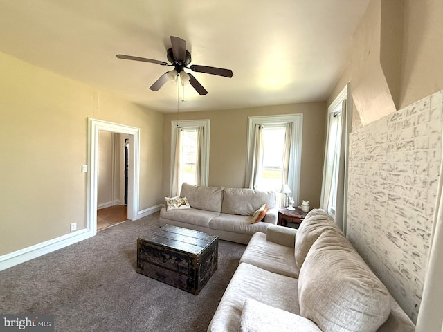 726 E Main St, Lock Haven, PA 17745 - living room featuring ceiling fan and carpet
