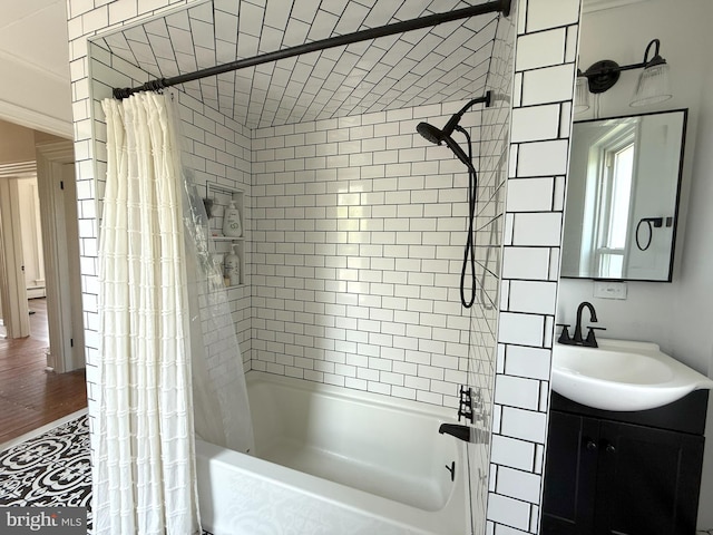 726 E Main St, Lock Haven, PA 17745 - bathroom featuring shower / tub combo, vanity, wood finished floors, and baseboard heating