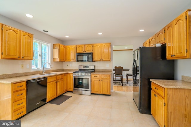 11 Adams Ct, Plainsboro, NJ 08536 - kitchen featuring black appliances, a sink, backsplash, light countertops, and recessed lighting