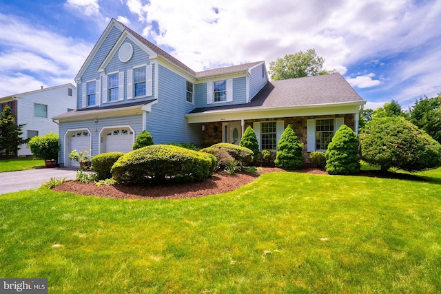 11 Adams Ct, Plainsboro, NJ 08536 - traditional home with a garage, driveway, and a front yard