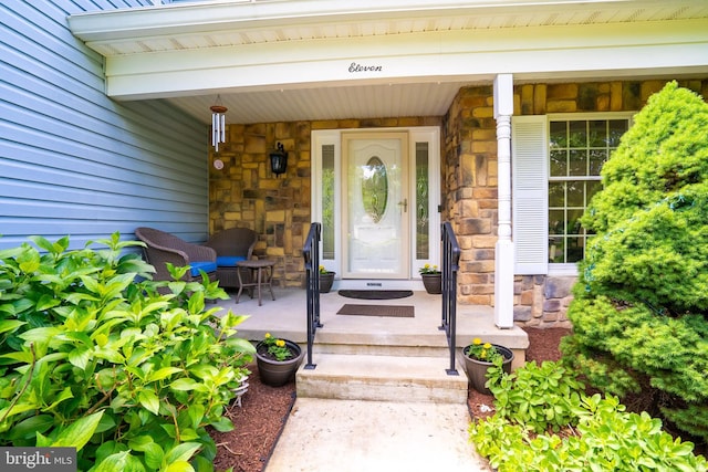 11 Adams Ct, Plainsboro, NJ 08536 - property entrance featuring stone siding and covered porch