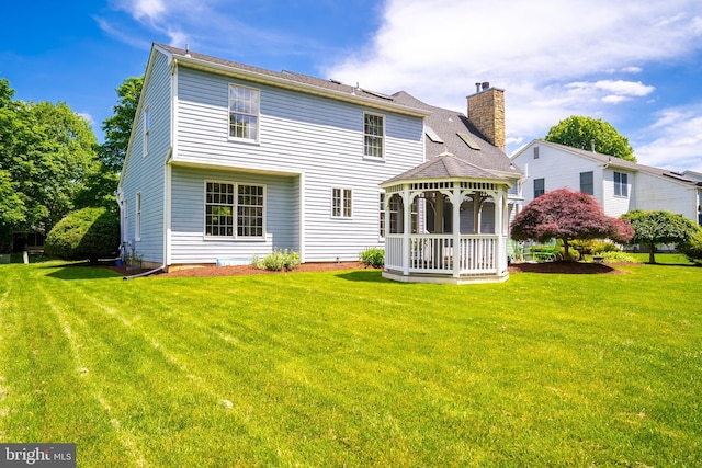 11 Adams Ct, Plainsboro, NJ 08536 - rear view of house featuring a gazebo, a lawn, and a chimney