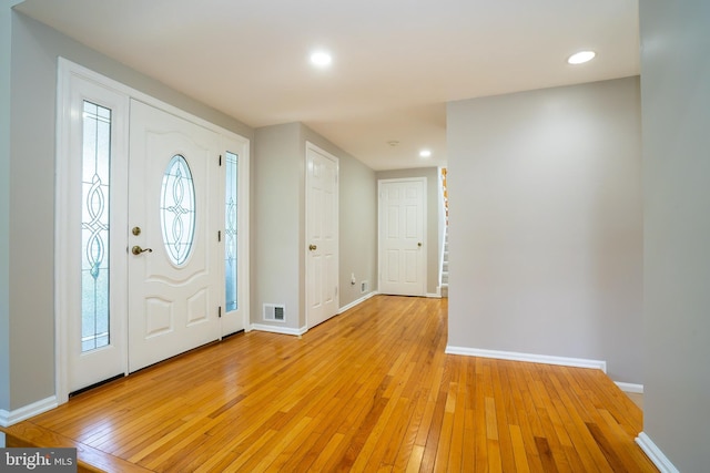 11 Adams Ct, Plainsboro, NJ 08536 - entrance foyer featuring light wood-style floors, baseboards, and recessed lighting