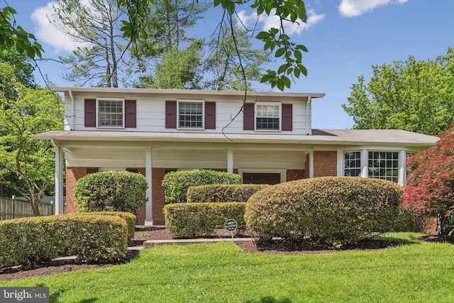 11706 Milbern Dr, Rockville, MD 20854 - traditional home featuring brick siding and a front lawn