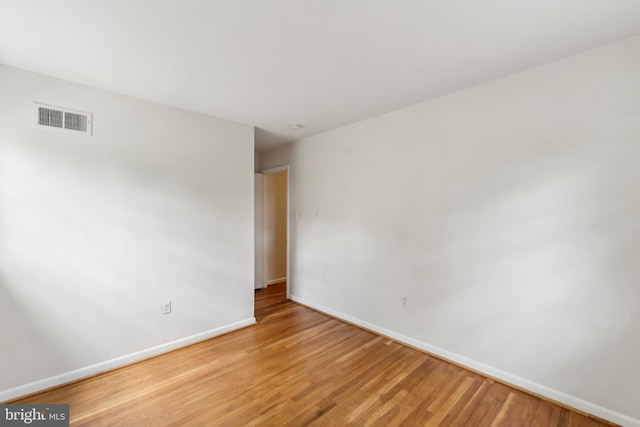 11706 Milbern Dr, Rockville, MD 20854 - empty room with baseboards and light wood finished floors
