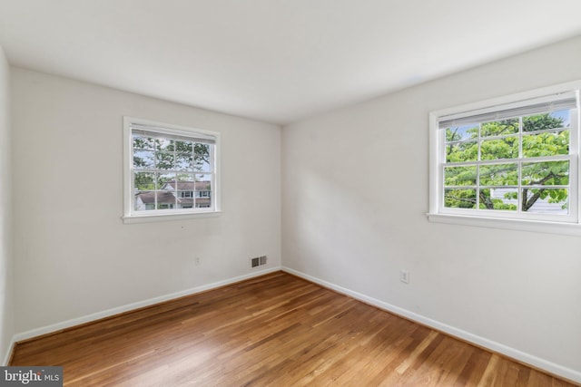11706 Milbern Dr, Rockville, MD 20854 - unfurnished room featuring light wood-style flooring and baseboards