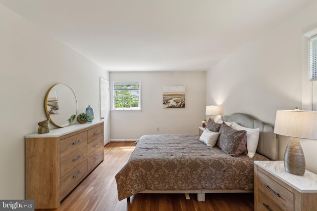11706 Milbern Dr, Rockville, MD 20854 - bedroom with light wood-style flooring