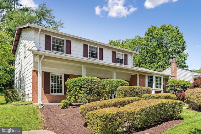 11706 Milbern Dr, Rockville, MD 20854 - traditional-style house featuring brick siding