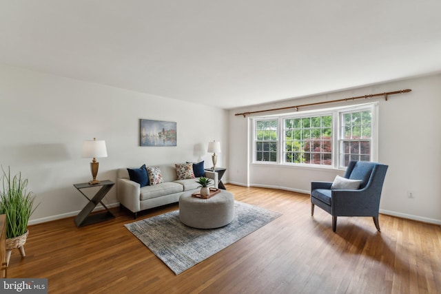 11706 Milbern Dr, Rockville, MD 20854 - living room with wood finished floors and baseboards