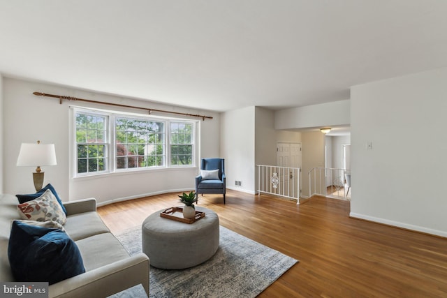 11706 Milbern Dr, Rockville, MD 20854 - living room featuring wood finished floors and baseboards