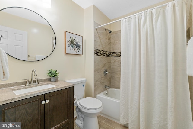 7102 Walnut Ave, Baltimore, MD 21208 - full bathroom featuring toilet, vanity, and shower / tub combo
