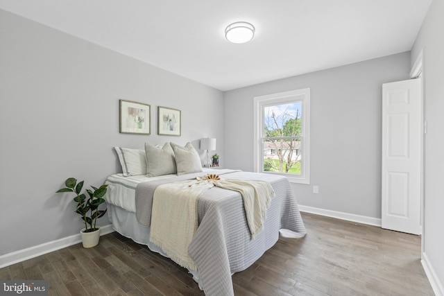 7102 Walnut Ave, Baltimore, MD 21208 - bedroom with wood finished floors and baseboards