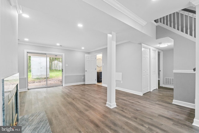 7102 Walnut Ave, Baltimore, MD 21208 - unfurnished living room with ornamental molding, recessed lighting, wood finished floors, and baseboards