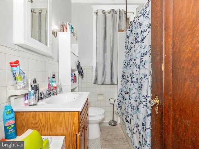 250 E E Main St, Waynesboro, PA 17268 - bathroom with tile walls, vanity, tile patterned floors, toilet, and a shower with curtain