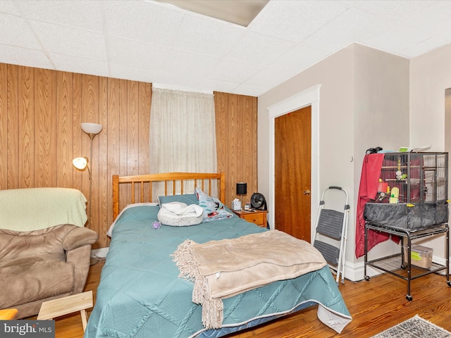 250 E E Main St, Waynesboro, PA 17268 - bedroom with wood finished floors and wooden walls